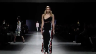 Gigi Hadid's Boob Popped Out to Say 'Yolanda' While Walking 'Literally the Longest Runway'